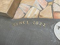 2022年7月施工/神奈川県・鷺沼T様現場/車庫コンクリートに真鍮レターとしてsince2022の文字を入れた画像