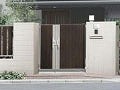 世田谷区の白い門袖と茶色い門扉を設置したクローズ外構の門まわり施工例