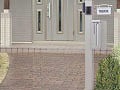世田谷区の門まわり施工例で玄関向かって右側にステンカラーのファンクションポールユニットを設置した画像
