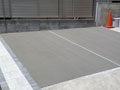 2022年7月施工/東京都世田谷区梅丘T様邸車庫拡張工事/草刈りから作業し、既存インターロッキングと同じ物を延長し、コンクリート打設した画像