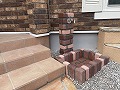 立水栓には建物と統一感を出すために茶色のレンガを使用した鷺沼のT様邸施工画像