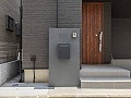大田区のオープン外構例0064｜太田区のT様邸外構工事施工例で、ダークグレー系門柱にオシャレな表札を合わせました